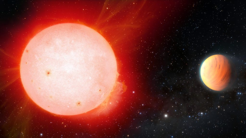 Um planeta fofo gigante orbitando uma estrela anã vermelha fria