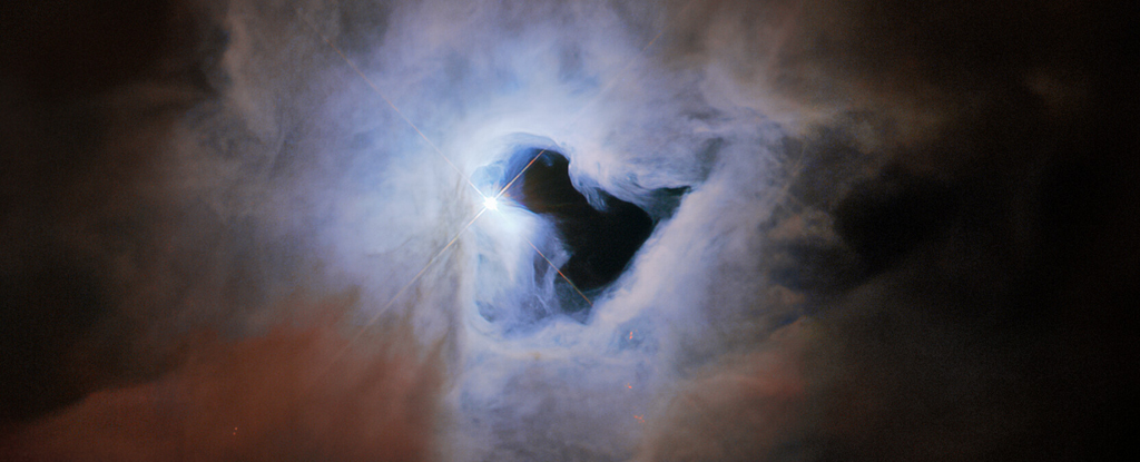 O telescópio Hubble encontrou um 'buraco de fechadura cósmico' nas profundezas do espaço e estamos maravilhados: ScienceAlert